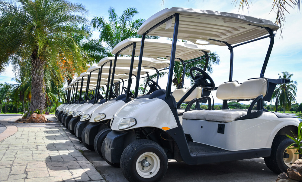 golf carts in a row